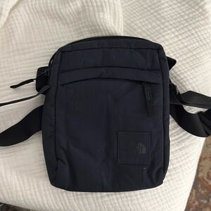 North face crossbody bag. Dark navy, nylon. Like new condition